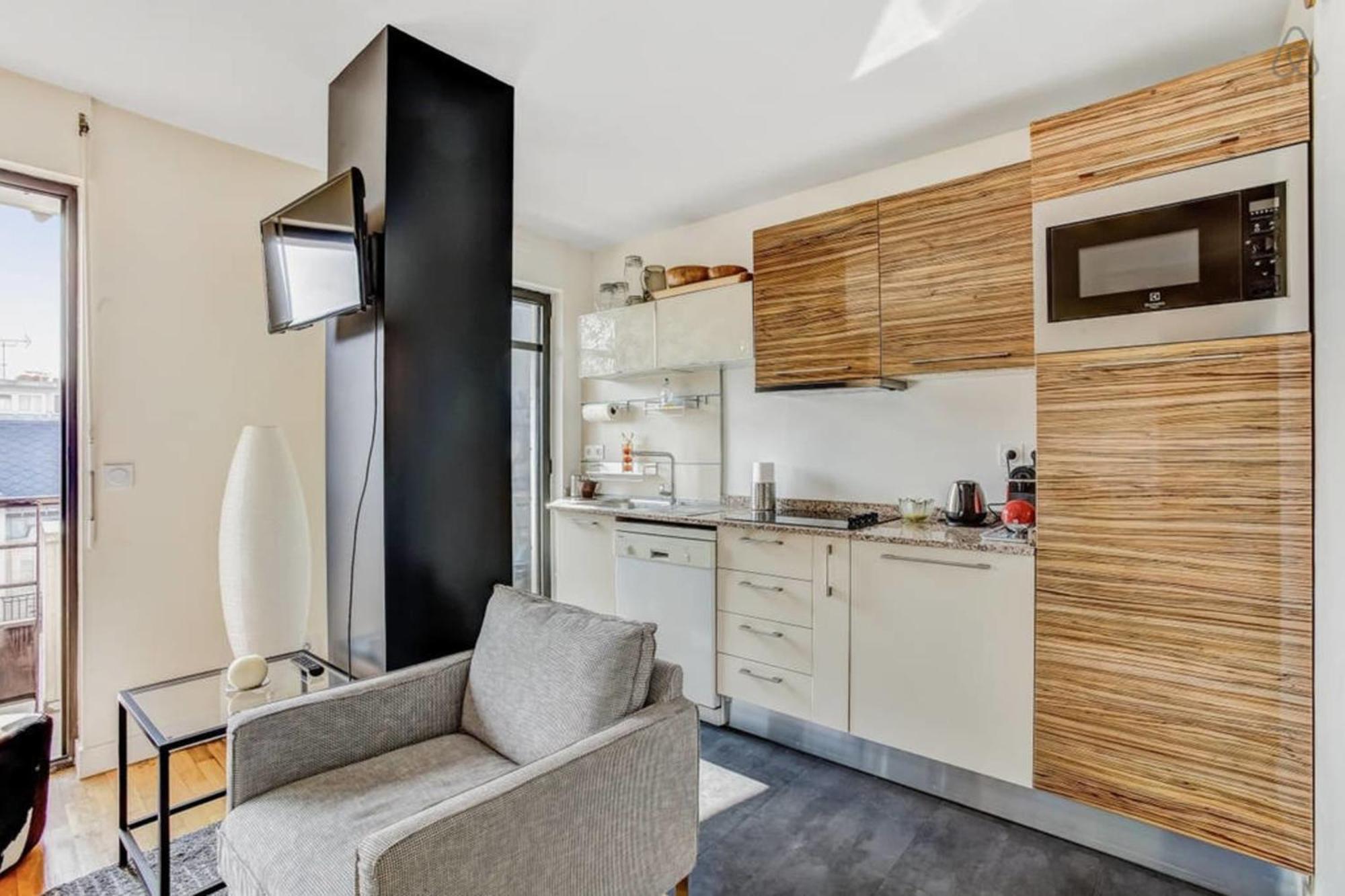 Appartement Des Toits - Welkeys ปารีส ภายนอก รูปภาพ
